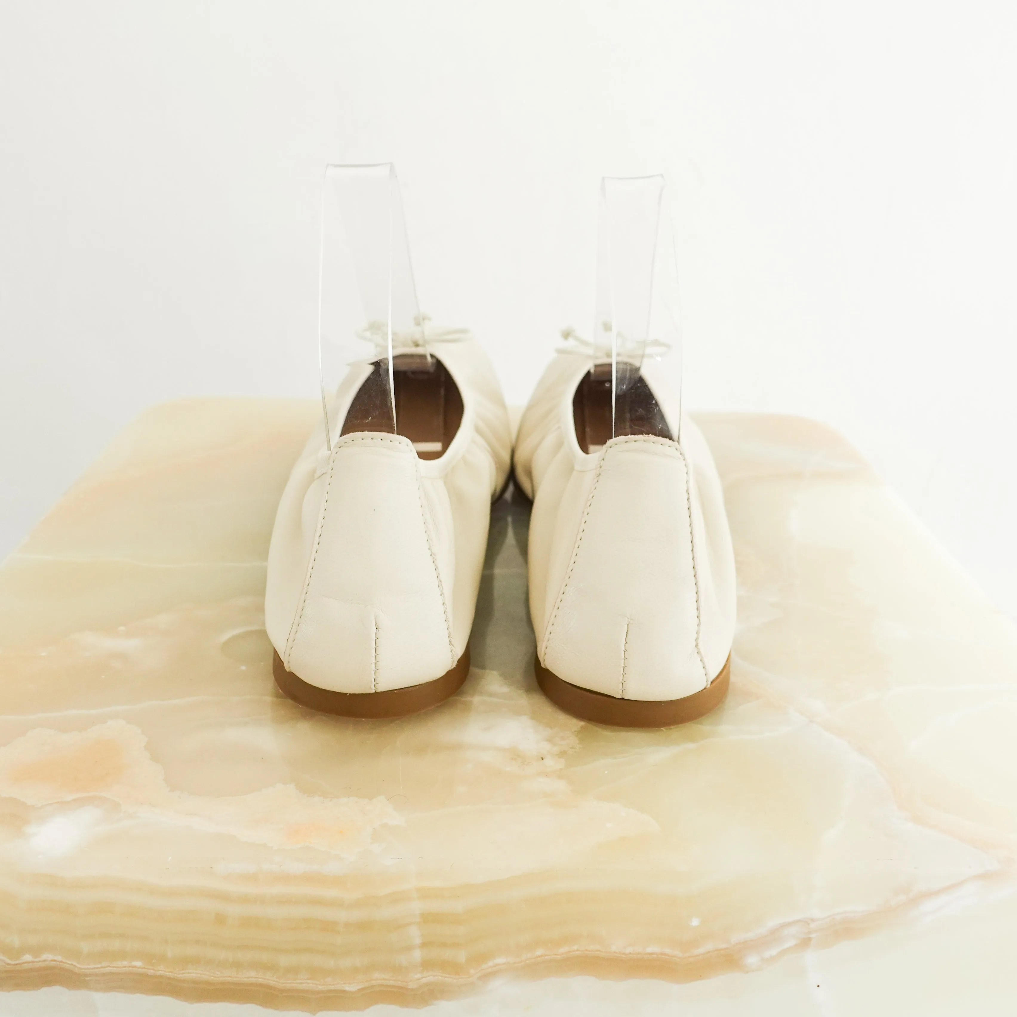 Cream ballet pumps RRP £199